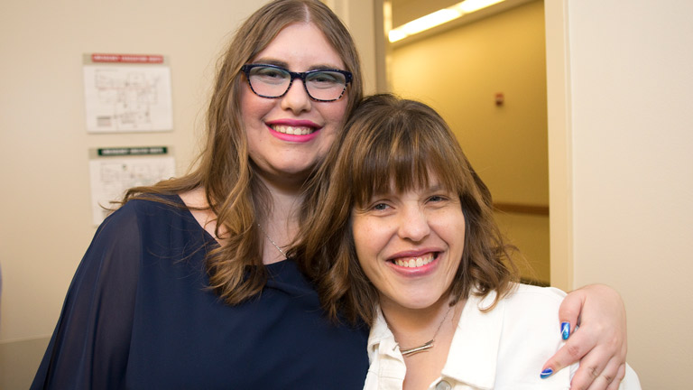 Women smiling at the camera