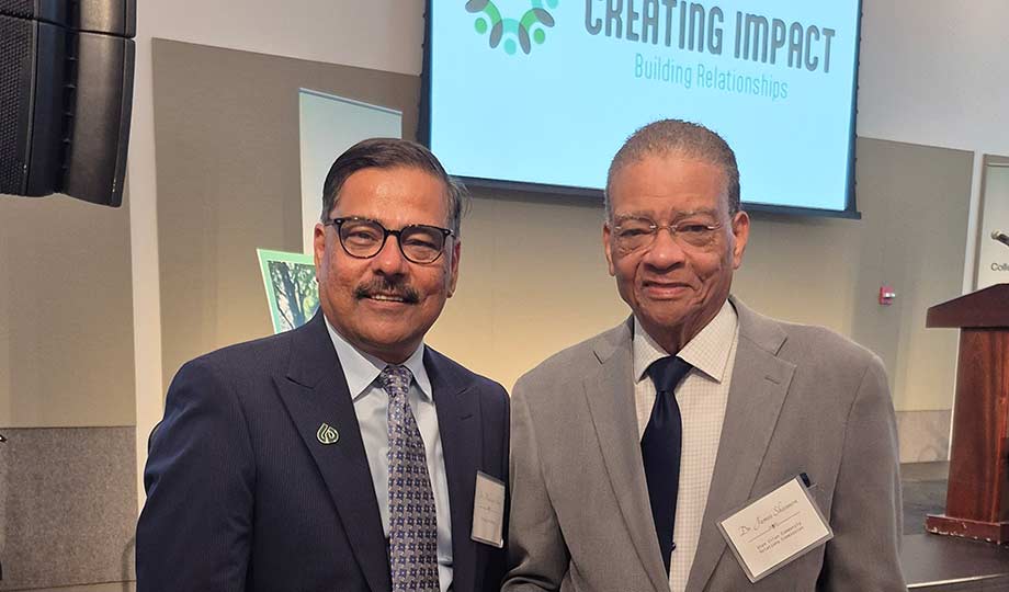 Dr. Siddiqi with community member