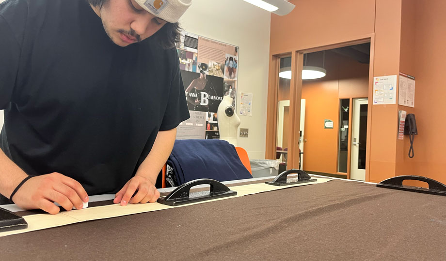 Fashion student working with fabric